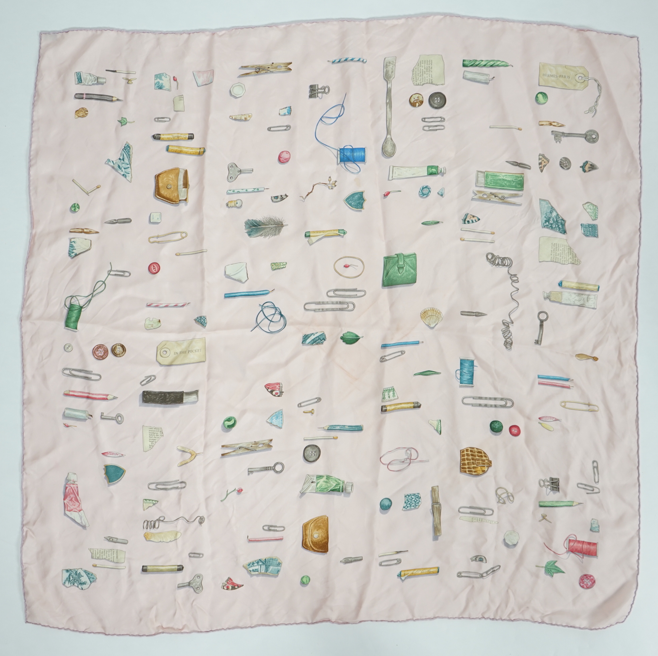 A Hermès 'In the Pocket' design silk scarf, 89cm x 89cm